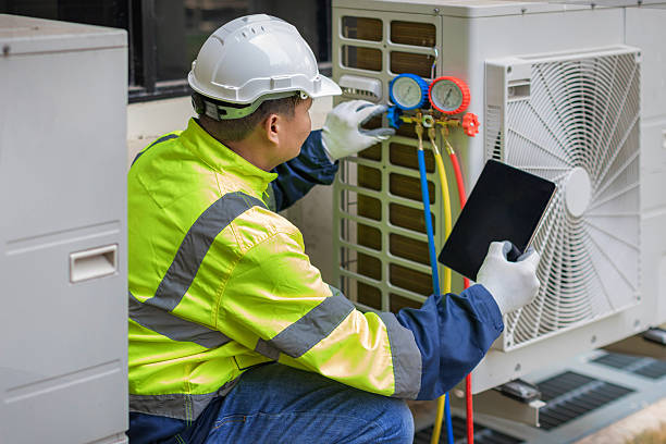 Professional Hvac technician working in Westhampton Beach, NY